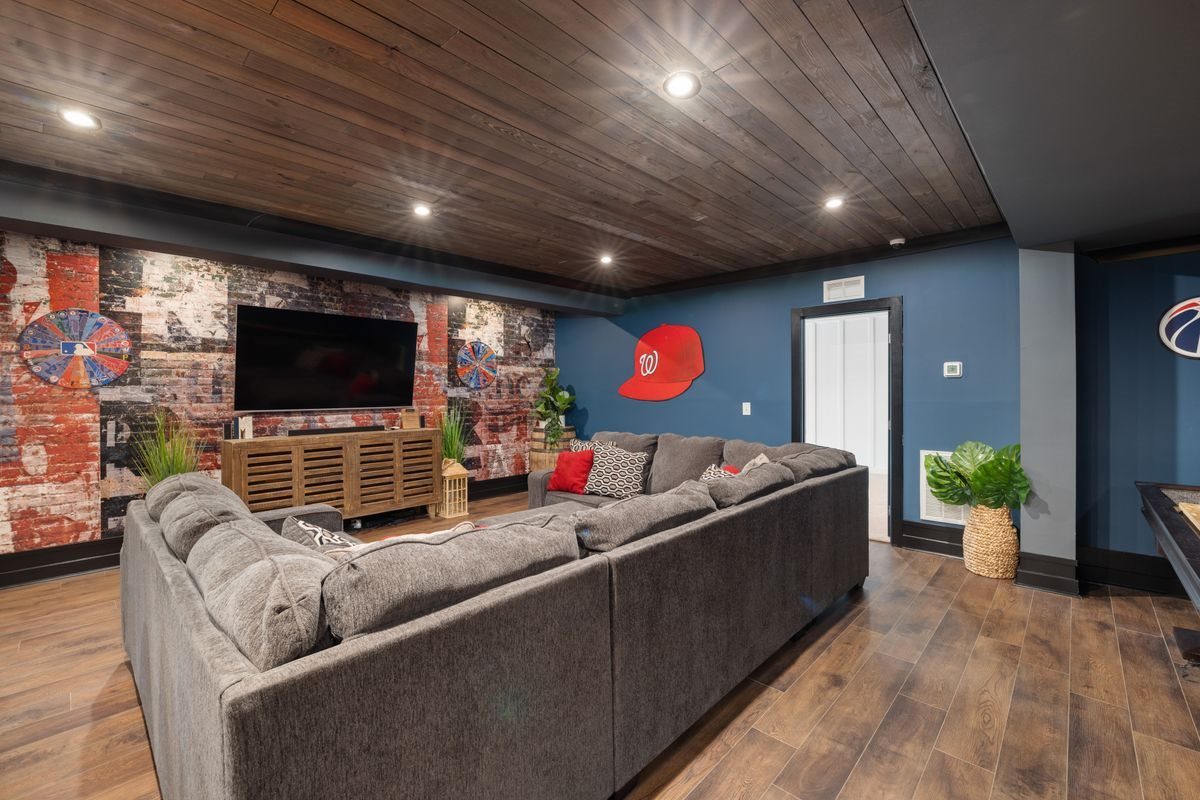 Finished basement rec room renovated by YER Renovations